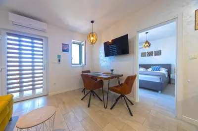Krevet ili kreveti u jedinici u objektu Vineyard oaza-Deluxe Apartments with Swimming pool
