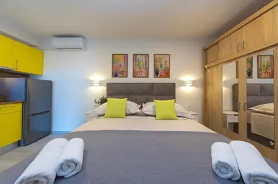 Krevet ili kreveti u jedinici u objektu Vineyard oaza-Deluxe Apartments with Swimming pool