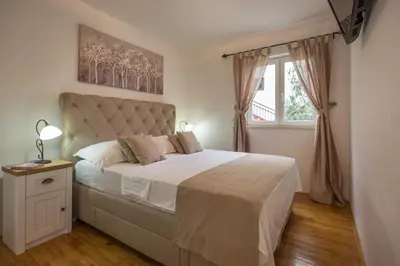 Krevet ili kreveti u jedinici u objektu Apartments Royal Residence