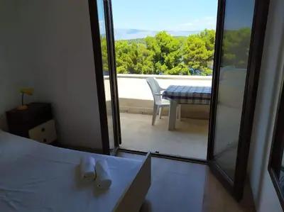 Krevet ili kreveti u jedinici u objektu Seafront apartment