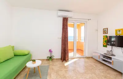 TV i/ili zabavni centar u objektu Apartments Orange