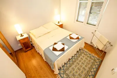 Krevet ili kreveti u jedinici u objektu Beach Front Villa, Garden, Quiet Bay, Boat Mooring - Villa Bleu Mer