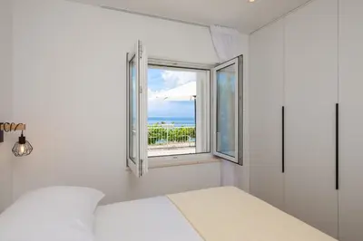 Krevet ili kreveti u jedinici u objektu Sandy Beach Oasis