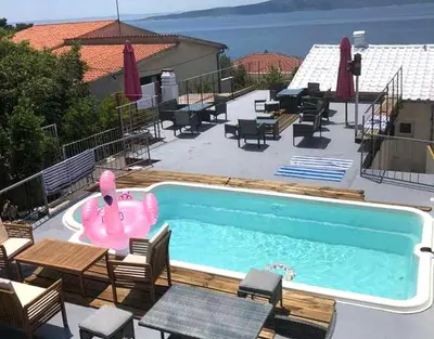 Bazen u objektu Family-friendly apartments with swimming pool Brela, Makarska - 22910 ili u blizini