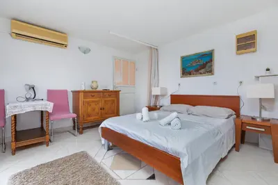 Krevet ili kreveti u jedinici u objektu Family-friendly apartments with swimming pool Brela, Makarska - 22910