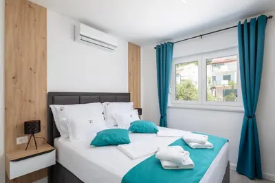 Krevet ili kreveti u jedinici u objektu EA Luxury Apartment with sea view