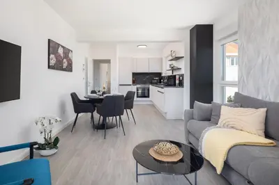 TV i/ili zabavni centar u objektu TT Apartment with sea view and private parking