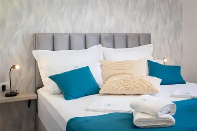 Krevet ili kreveti u jedinici u objektu TT Apartment with sea view and private parking