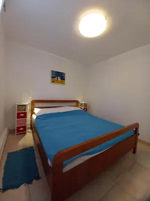 Krevet ili kreveti u jedinici u objektu Marina Crveni Apartman