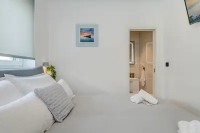 Krevet ili kreveti u jedinici u objektu Modern two-bedroom apartment Iva Stobrec