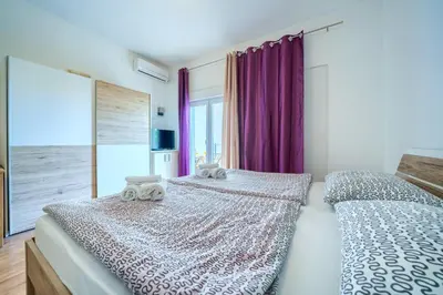 Krevet ili kreveti u jedinici u objektu Cozy New Apartments with Private Pool Podstrana