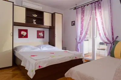 Krevet ili kreveti u jedinici u objektu Yellow house apartments