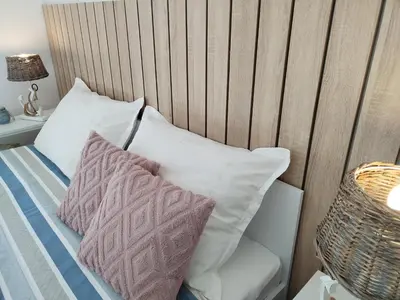 Krevet ili kreveti u jedinici u objektu Beachfront apartment Suncana