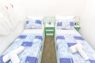 Krevet ili kreveti u jedinici u objektu Apartments Sunset
