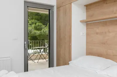 Krevet ili kreveti u jedinici u objektu Villa Brela apartments