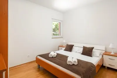 Krevet ili kreveti u jedinici u objektu Apartments Teo - Center with Free Parking