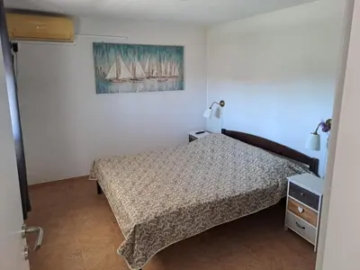 Krevet ili kreveti u jedinici u objektu BenJak Apartment 2