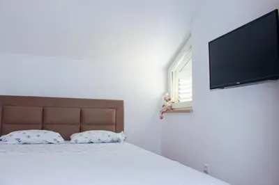 TV i/ili zabavni centar u objektu Apartment Zen