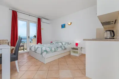 Krevet ili kreveti u jedinici u objektu Apartments by the sea Lokva Rogoznica, Omis - 23105