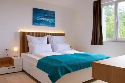 Krevet ili kreveti u jedinici u objektu JOELL Apartments