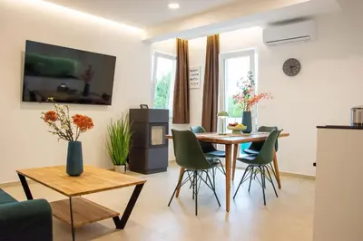 TV i/ili zabavni centar u objektu JOELL Apartments