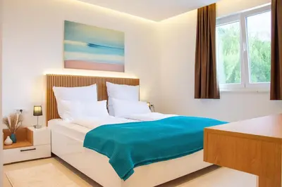 Krevet ili kreveti u jedinici u objektu JOELL Apartments