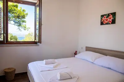 Krevet ili kreveti u jedinici u objektu Vacation Home Katarina