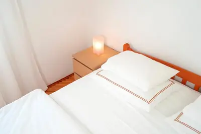 Krevet ili kreveti u jedinici u objektu Apartments Dulcic