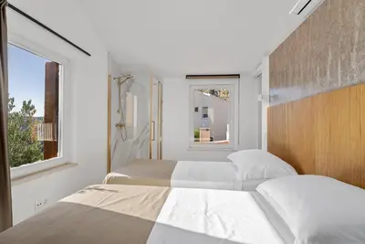 Krevet ili kreveti u jedinici u objektu Villa Favola Omis 360 PHOTOS-VIRTUAL TOUR ON DEMAND
