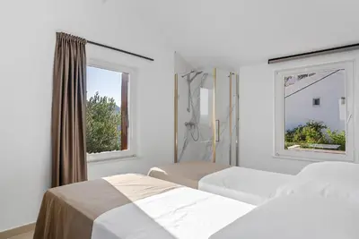 Krevet ili kreveti u jedinici u objektu Villa Favola Omis 360 PHOTOS-VIRTUAL TOUR ON DEMAND