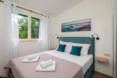 Krevet ili kreveti u jedinici u objektu La Playa Beach Apartment