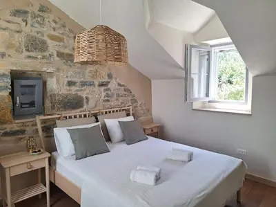 Krevet ili kreveti u jedinici u objektu Stone house Gazda