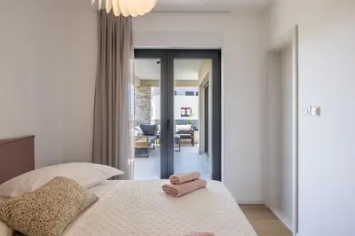 Krevet ili kreveti u jedinici u objektu Sal Mare - luxury and elegant family apartment