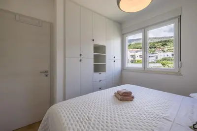 Krevet ili kreveti u jedinici u objektu Sal Mare - luxury and elegant family apartment
