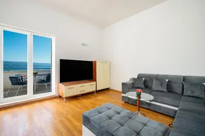 TV i/ili zabavni centar u objektu Sea Star Beach Apartments