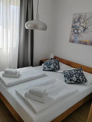 Krevet ili kreveti u jedinici u objektu L&L Apartmani 1