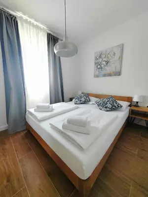 Krevet ili kreveti u jedinici u objektu L&L Apartmani 1