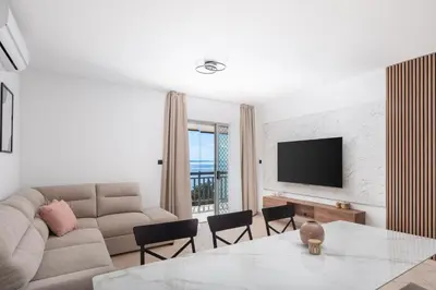 TV i/ili zabavni centar u objektu Bella Figura Apartments - Heated Pool