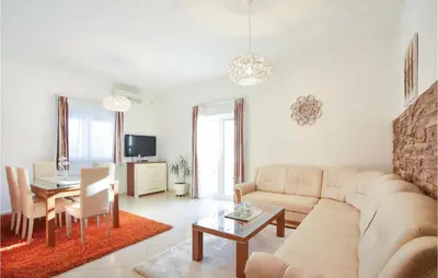 TV i/ili zabavni centar u objektu Cozy Home In Podstrana With Sauna