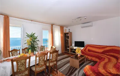 TV i/ili zabavni centar u objektu Apartment Omis Lxxvi