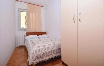 Krevet ili kreveti u jedinici u objektu Apartment Omis Lxxvi