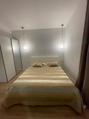 Krevet ili kreveti u jedinici u objektu Apartman M