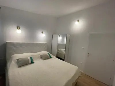 Krevet ili kreveti u jedinici u objektu Apartman V