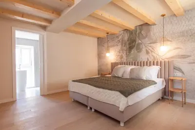Krevet ili kreveti u jedinici u objektu Heritage House Kaleta