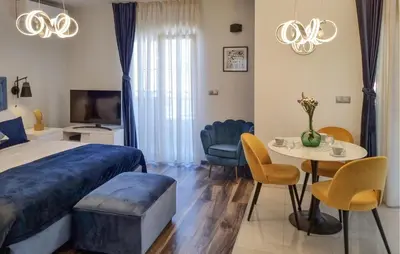 TV i/ili zabavni centar u objektu Amazing Home In Dugi Rat With Sauna
