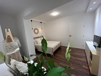 TV i/ili zabavni centar u objektu Apartment Mediteran
