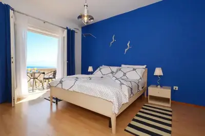 Krevet ili kreveti u jedinici u objektu Bol Bliss Apartments
