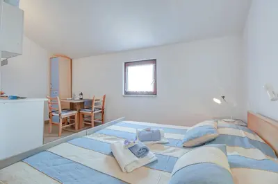 Krevet ili kreveti u jedinici u objektu Loft studio apartment near center