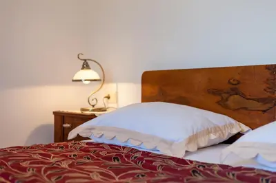 Krevet ili kreveti u jedinici u objektu Villa Vjeka Cozy Family Retreat with Heated Pool, Brač Island