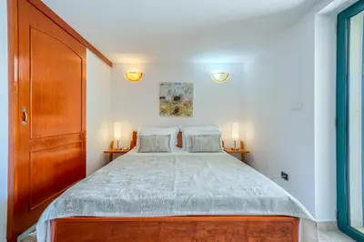 Krevet ili kreveti u jedinici u objektu Villa Rasotica Relaxing Villa with Heated Pool, Perfect for Families